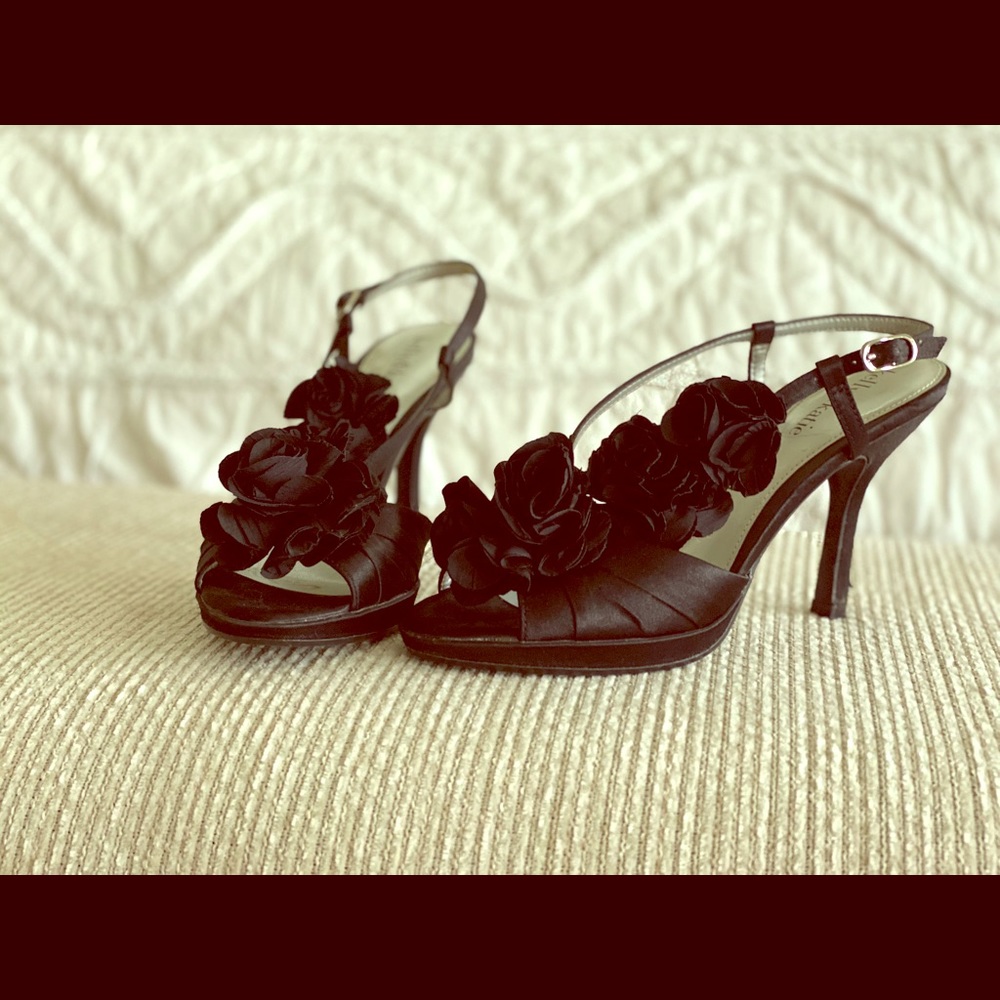 Black rosette heels